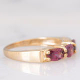 Trilogy in oro giallo 9K con granati (1.36ctw ca.)
