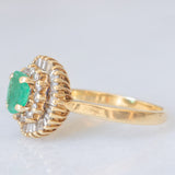 Anello ballerina vintage in oro giallo 14K con smeraldo (0.50ct ca.) e diamanti di taglio brillante e di taglio tapered (0.50ctw ca.), anni ‘70