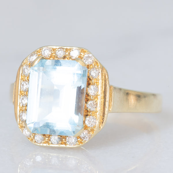 Anello vintage in oro giallo 14K con topazio azzurro (2.80ct ca.) e diamanti di taglio brillante (0.16ctw ca.), anni ‘80/‘90