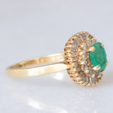 Anello ballerina vintage in oro giallo 14K con smeraldo (0.50ct ca.) e diamanti di taglio brillante e di taglio tapered (0.50ctw ca.), anni ‘70