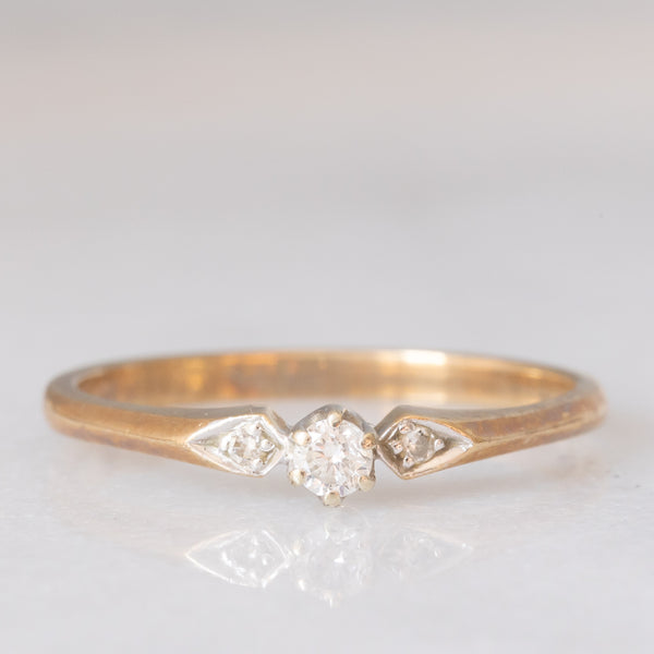 Trilogy vintage in oro giallo 9K con diamanti (centrale di taglio brillante e di 0.10ct ca.), anno 1995