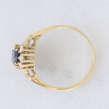 Anello a margherita vintage in oro giallo 14K con zaffiro (0.70ct ca.) e diamanti (0.20ctw ca.), anni ‘80