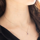 Collana vintage in platino con ciondolo con rubino (0.26ct) e diamanti di taglio brillante (0.13ctw)