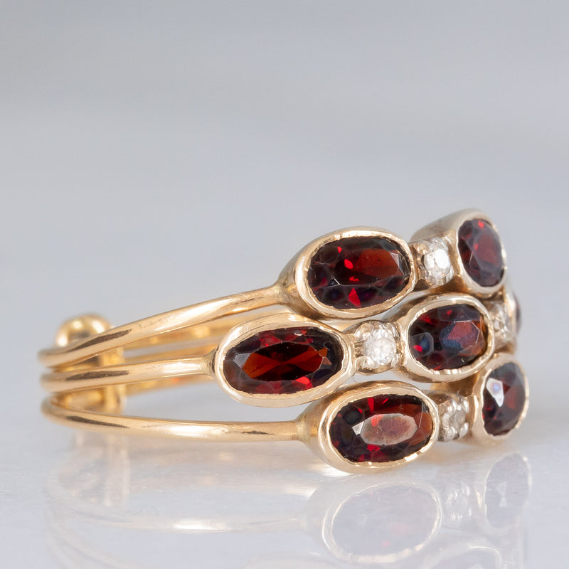 Anello harem in oro giallo 18K con granati (1.50ctw ca.) e pietre bianche, anni ‘60/‘70