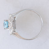 Anello ballerina vintage in platino con acquamarina (0.60ct) e diamanti (0.27ctw), anni ‘80