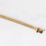 Braccialetto vintage in oro giallo 8K con granati (0.90ctw ca.), anni ‘50