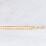 Vintage 18K yellow gold and silver semi-rigid bracelet with crescent-shaped decorations and rose-cut diamonds, 50s