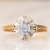 Anello a margherita in oro giallo 9K con zaffiro (0.35ct ca.) e diamanti (0.04ctw ca.), anno 1991