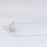 Collier vintage in platino con decorazione con quadrifogli con diamanti (0.43ctw)