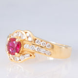 Anello a margherita vintage in oro giallo 18K con rubino (0.51ct) e diamanti (0.41ctw), anni ‘80/‘90