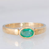 Solitario in oro giallo 9K con smeraldo (0.33ct)