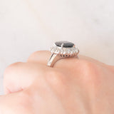 Anello a margherita vintage in platino con zaffiro (4.30ct) e diamanti (1.05ctw), anni ‘80