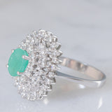 Vintage-Gänseblümchenring aus 14-karätigem Weißgold mit Smaragd (ca. 0.50 ct) und Diamanten (ca. 0.44 ctw), 80er/90er Jahre