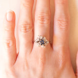 Vintage 18K white gold flower ring with sapphire (0.50ct approx.) and diamonds (0.24ctw approx.), 80s