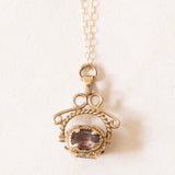 Vintage-Halskette mit drehbarem Anhänger aus 9-karätigem Gelbgold mit Quarz und Granat