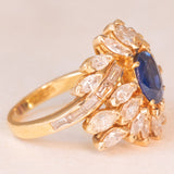 Vintage 18K yellow gold ring with sapphire (1.20ct approx.) and marquise and baguette cut diamonds (2.70ctw approx.), 70s