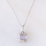 Collier vintage in platino con tanzanite e diamanti (0.62ctw)