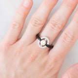 Anello vintage in stile Art Déco in platino con diamanti (centrale di 0.75ct) e onice