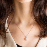 Collana vintage in platino con ciondolo con diamanti (0.56ctw), anni ‘80/‘90