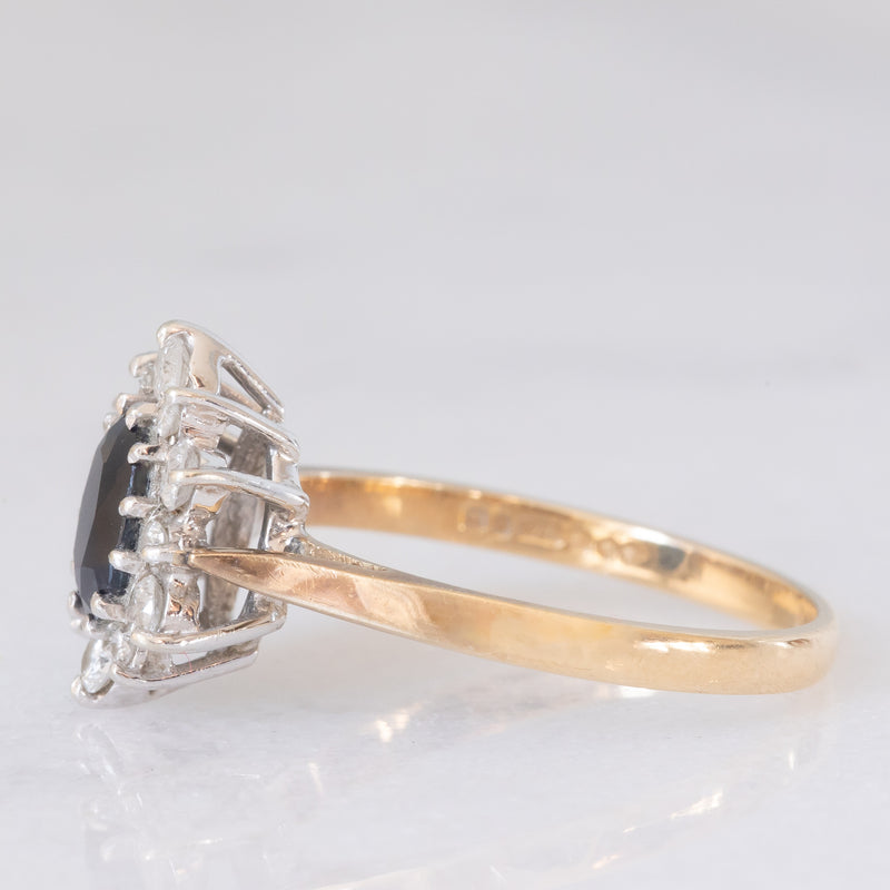 Anello a margherita vintage in oro giallo 9K con zaffiro (1ct ca.) e diamanti di taglio brillante (0.33ctw ca.), anno 1987