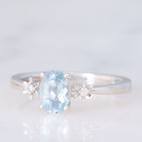 Trilogy vintage in oro bianco 18K con acquamarina (0.60ct ca.) e diamanti, anni ‘80