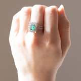 Vintage French daisy ring in platinum and 18K white gold with emerald (approx. 0.90ct) and diamonds (approx. 0.70ctw), 50s/60s