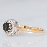 Anello a margherita vintage in oro giallo e bianco 9K con zaffiro (0.30ct ca.) e diamanti (0.10ctw ca.), anni ‘80