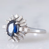 Anello a margherita vintage in platino con zaffiro (1.27ct) e diamanti (0.43ctw), anni ‘80