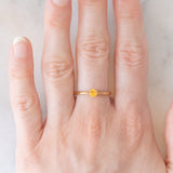 Solitario vintage in oro giallo 9K con spessartite (0.27ct ca.)
