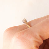 Vintage-Trilogie aus 9-karätigem Gelbgold mit Diamanten im Brillantschliff (ca. 0.25 ctw), ca. 70er/80er Jahre.