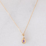Collana vintage in oro giallo 10K con punto luce con ametista e diamante