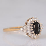 Bague marguerite vintage en or jaune et blanc 9 carats avec saphir (environ 1 ct) et diamants (environ 0.22 ct au total), 1989