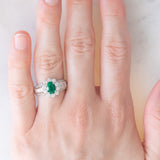 Anello a fiore vintage in platino con smeraldo (0.81ct) e diamanti (0.93ctw), anni ‘80