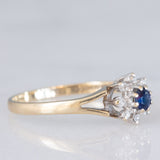 Anello a margherita vintage in oro giallo 9K con zaffiro (0.10ct ca.) e diamanti (0.08ctw ca.), anno 1987
