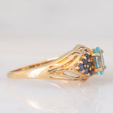 Anello vintage in oro giallo 9K con apatite (0.80ctw ca.) e zaffiri (0.37ctw ca.), anni ‘80/‘90