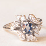 Vintage 18K white gold flower ring with sapphire (0.50ct approx.) and diamonds (0.24ctw approx.), 80s