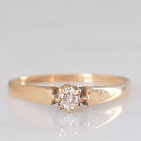 Solitario vintage in oro giallo 9K con diamante di taglio brillante (0.10ct ca.), anno 1989