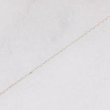 Collana vintage in oro bianco 10K con ciondolo punto luce con zaffiro rosa e diamante