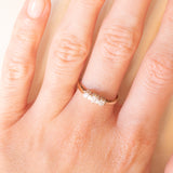 Vintage-Trilogie aus 9-karätigem Gelbgold mit Diamanten im Brillantschliff (ca. 0.25 ctw), ca. 70er/80er Jahre.