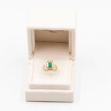 Vintage 18K yellow gold ring with emerald (approx. 0.90ct) and diamonds (approx. 0.94ctw), 80s