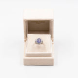 ANELLO BALLERINA IN PLATINO CON ZAFFIRO STELLATO (6.95CT) E DIAMANTI (0.82CT)