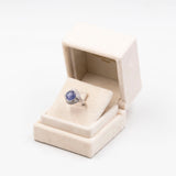ANELLO BALLERINA IN PLATINO CON ZAFFIRO STELLATO (6.95CT) E DIAMANTI (0.82CT)