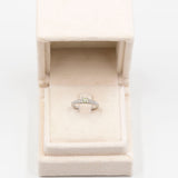 Anello vintage in platino 900 con diamante centrale di 0,33ct e diamanti di contorno di 0,29ctw