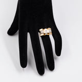 Vintage-Ring „Tank“ aus 18 Karat Gelbgold mit Diamant im Brillantschliff (0.12 ct) und Rosetten, 40er Jahre