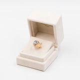 ANELLO CHEVALIER VINTAGE IN ORO GIALLO 18K CON TOPAZIO AZZURRO