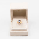 ANELLO CHEVALIER VINTAGE IN ORO GIALLO 18K CON TOPAZIO AZZURRO