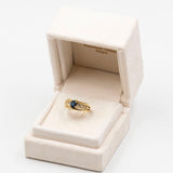 Vintage-Ring aus 18 Karat Gelbgold mit Saphir (0.40 ct) und Diamanten (0.18 ctw), 70er Jahre