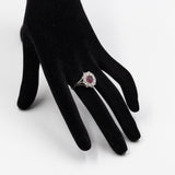 Anel vintage margarida em ouro branco 18k com rubi (1 quilate) e diamantes (1,16 quilates), década de 70