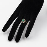 Anello vintage in oro giallo 14k con smeraldo (0,50ct) e diamanti (0,08ctw)