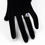 ANELLO VINTAGE A BALLERINA IN PLATINO CON ZAFFIRO (0.56CT) E DIAMANTI (0.46CTW)